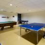 Freizeitraum mit Billardtisch, Tischtennisplatte und Tischfußball im City Hotel.
